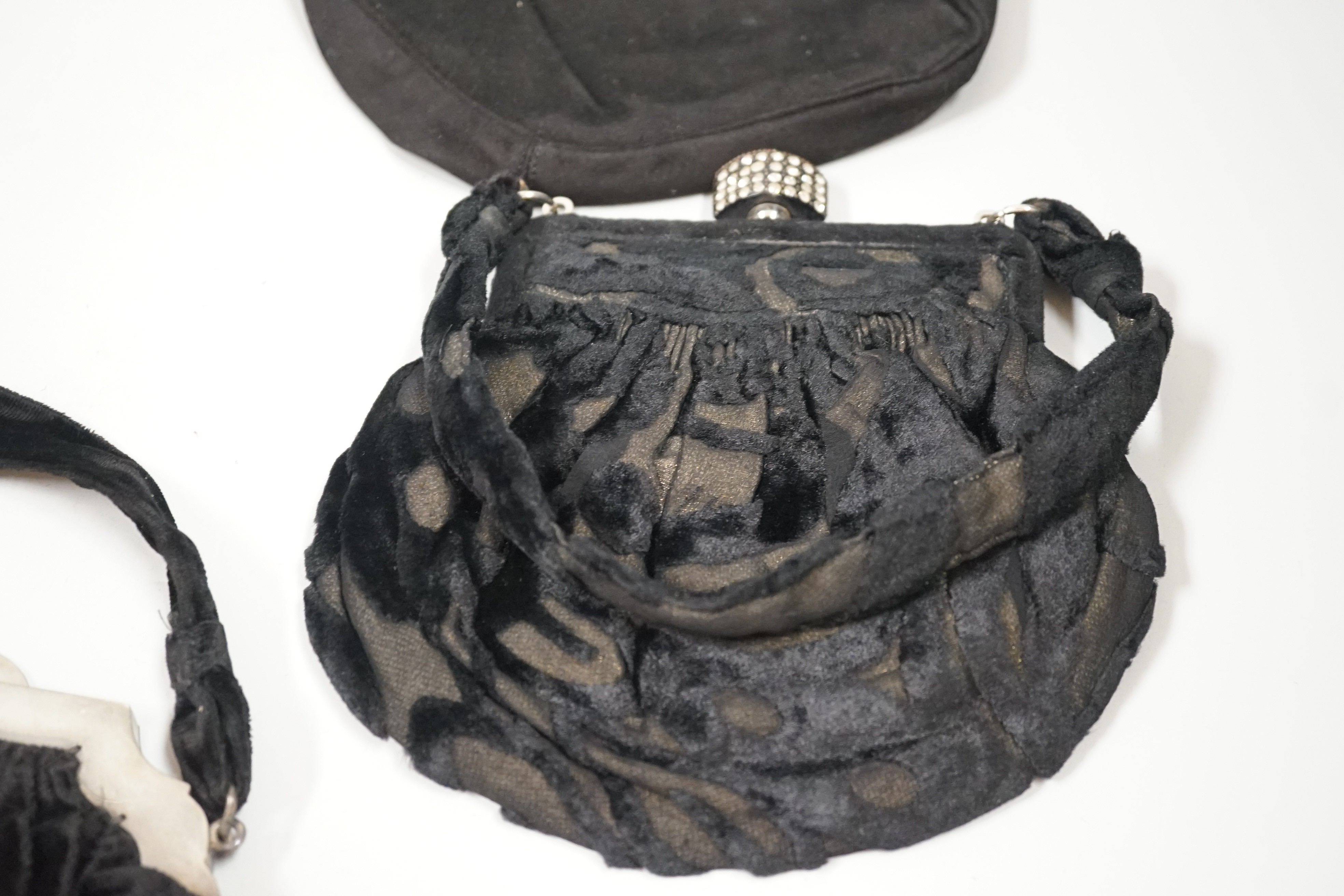 A 1930’s evening bag with silver frame, seven 1930’s-40’s evening bags with diamante encrusted Bakelite frames and clasps, a costume jewelled bag and two gilt and sequin bags